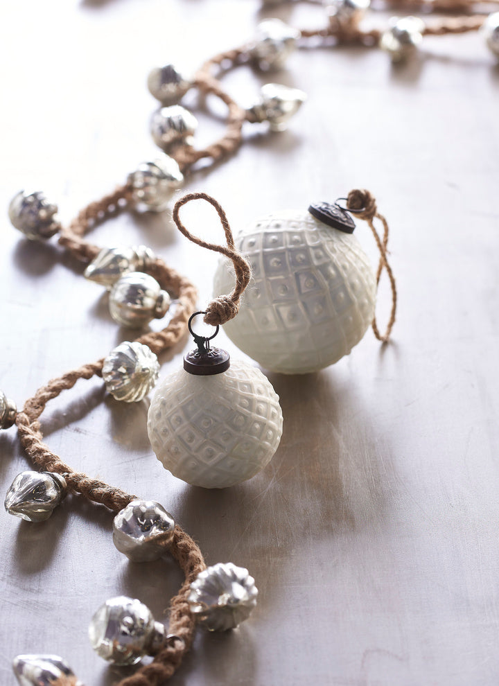 Plaid ribbon and glass ornaments